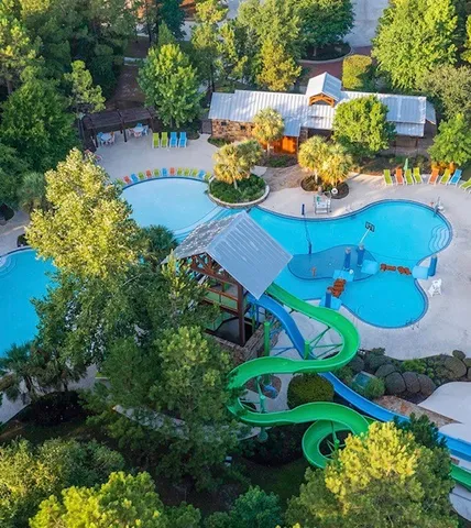 an aerial view of a table & chairs and a flower pot