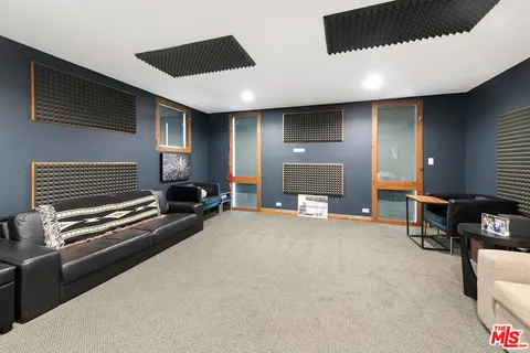 a view of kitchen with furniture and a fireplace