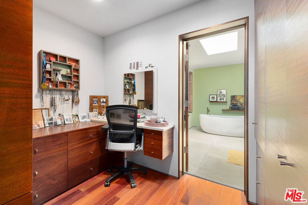 417 Venice Way Venice, CA 90291 - Photo 34 of 53 a view of a workspace with furniture and cabinet