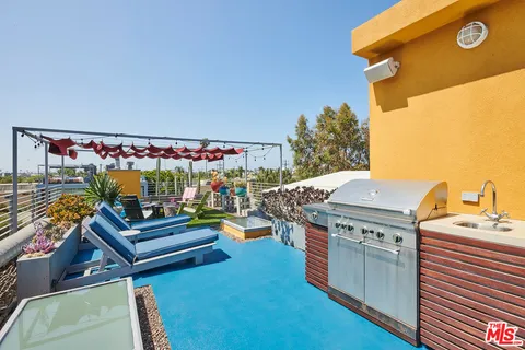 a view of a chairs and table in the terrace