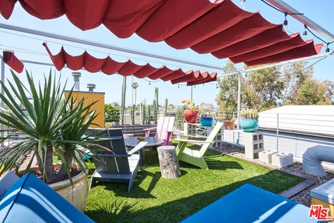 a front view of a house with a swimming pool