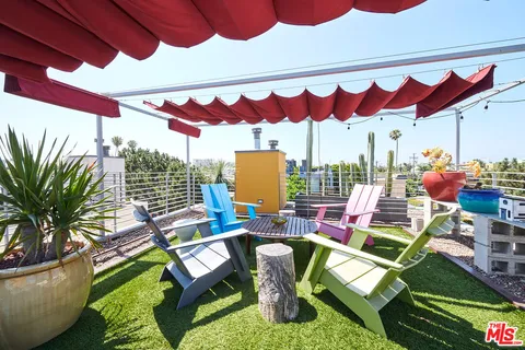 a view of a chairs in patio of the house