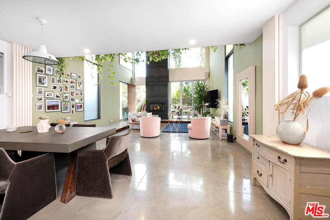 417 Venice Way Venice, CA 90291 - Photo 7 of 53 a view of a dining room with furniture and a potted plant