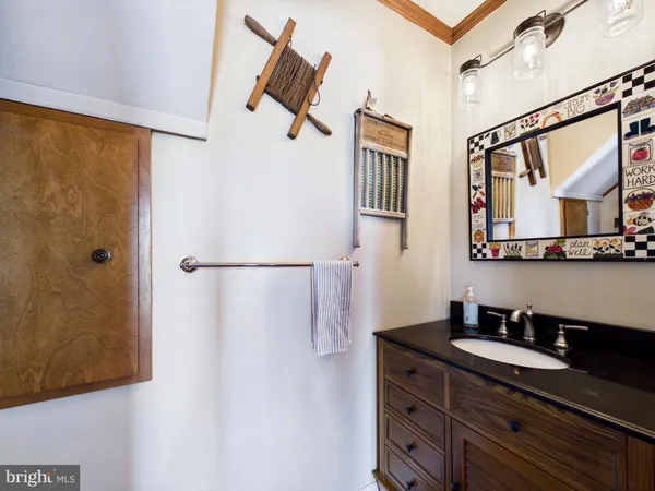 a bathroom with a shower curtain and a toilet