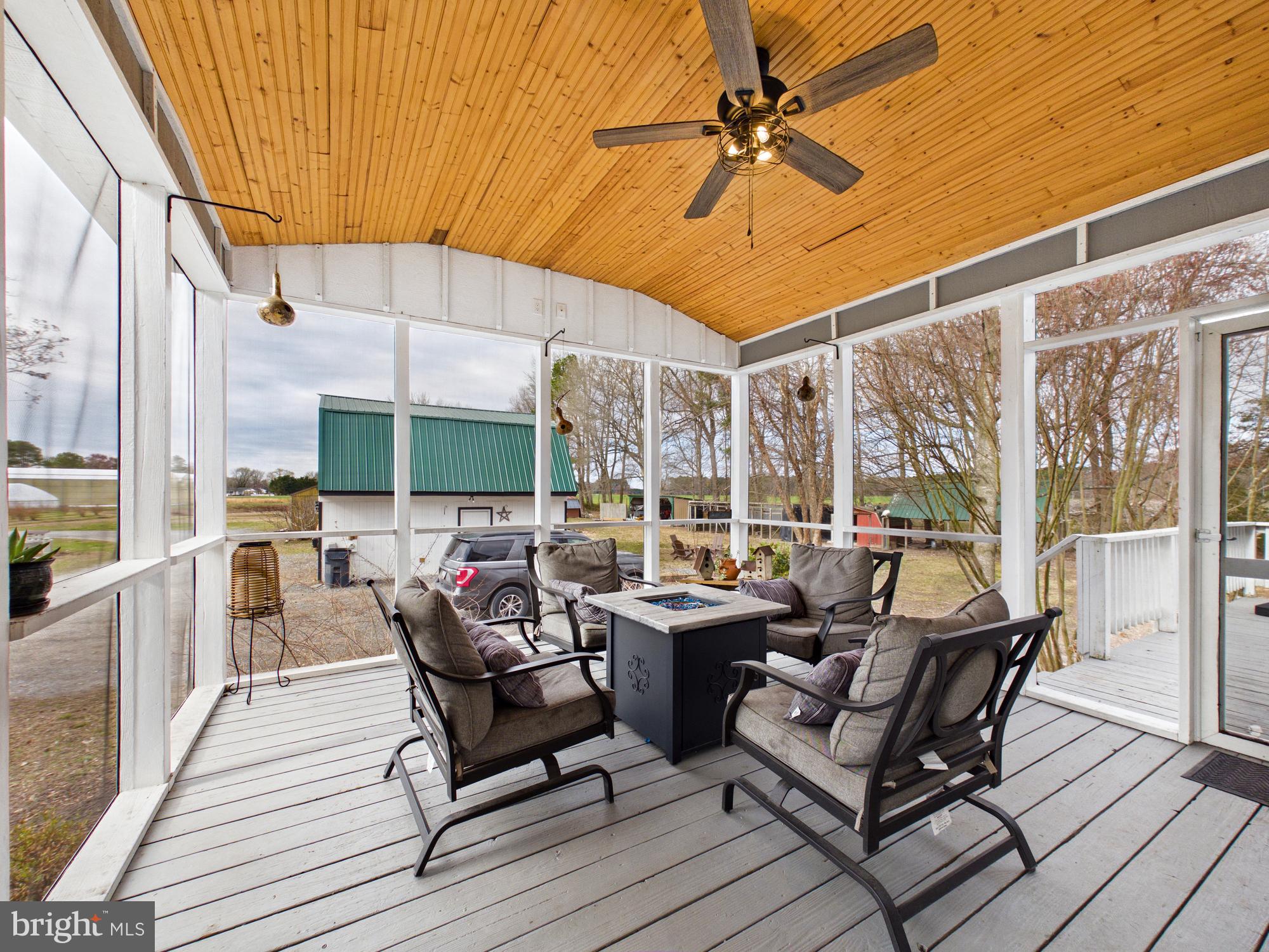 8416 Harmony Road Denton, MD 21629 - Photo 47 of 111 Covered, screened in side porch.