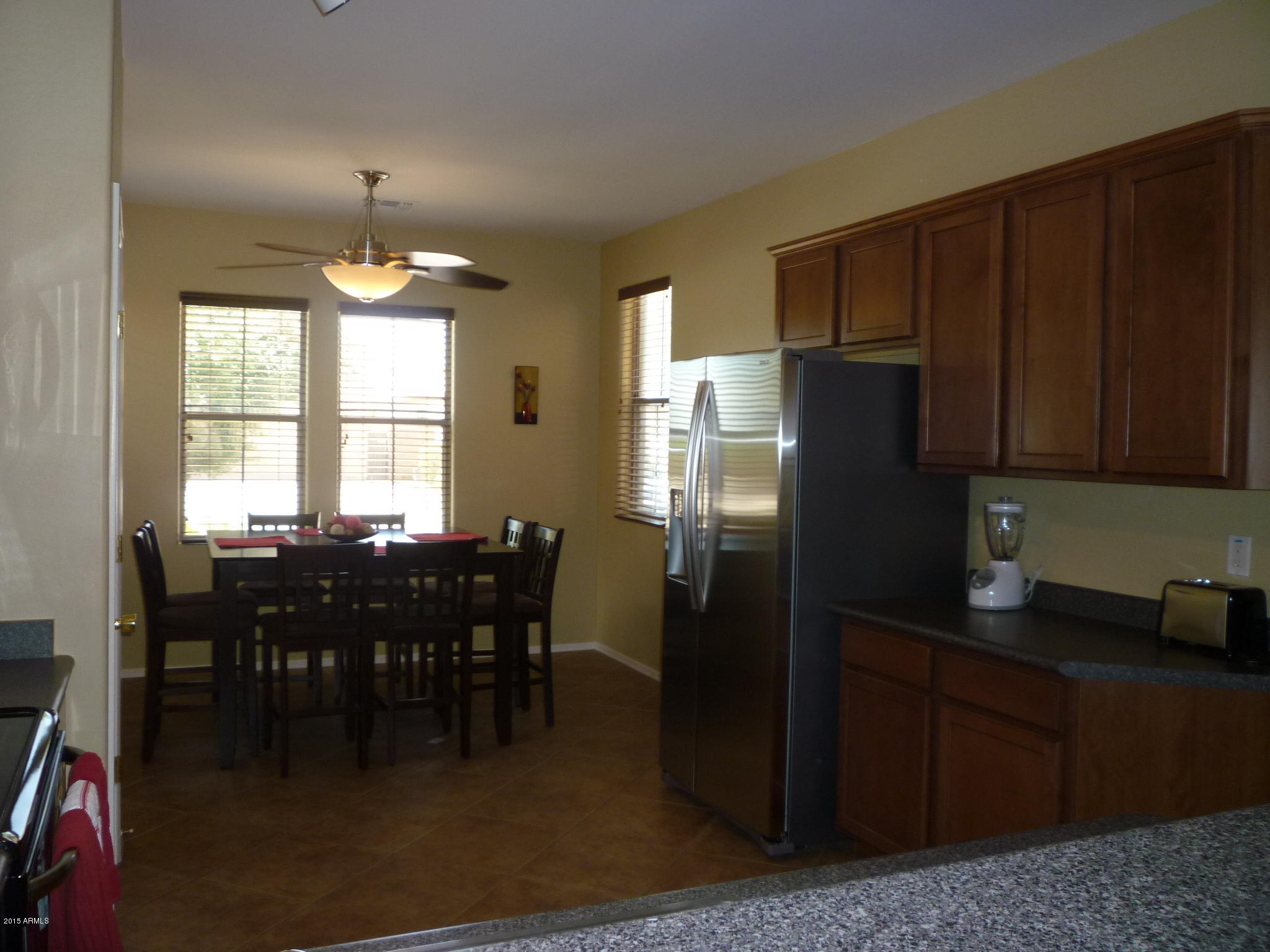 15476 West Redfield Road Surprise, AZ 85379 - Photo 21 of 75 EAT-IN KITCHEN