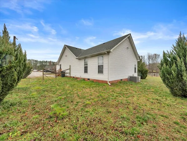 a house view with a garden space