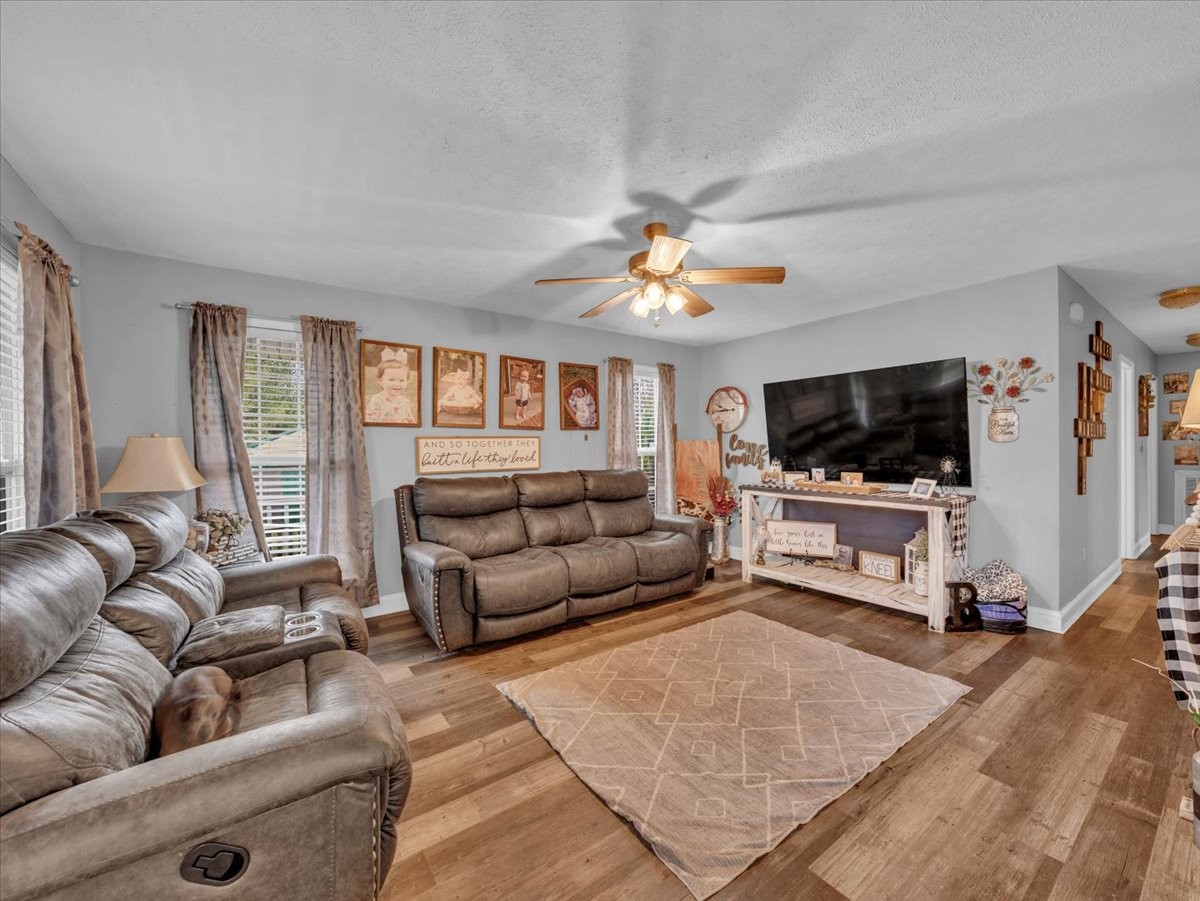 9 Merideth Lynn Road Fayetteville, TN 37334 - Photo 7 of 31 a living room with furniture and a flat screen tv