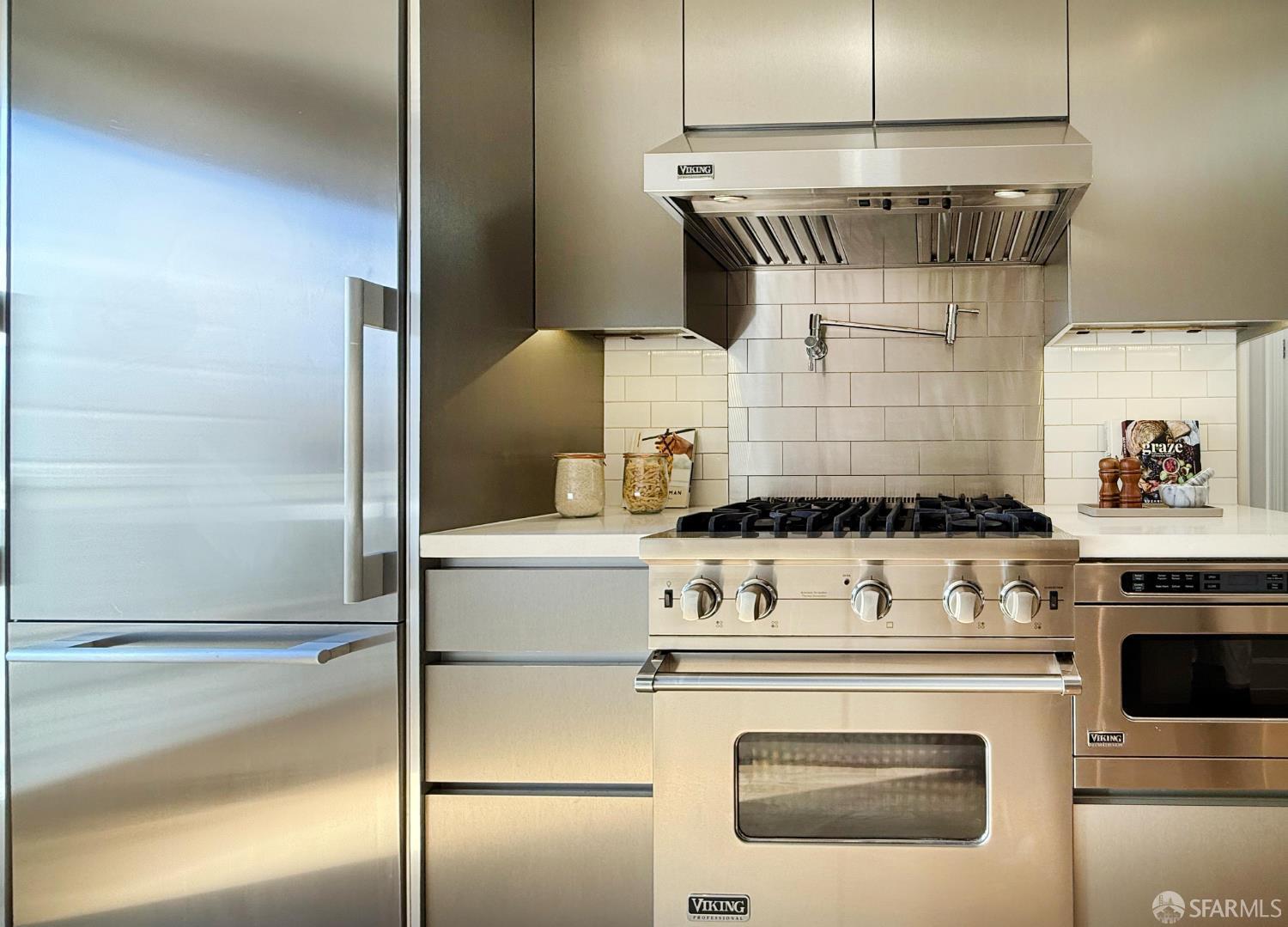 639 14th Street San Francisco, CA 94114 - Photo 12 of 54 a stove top oven sitting inside of a kitchen