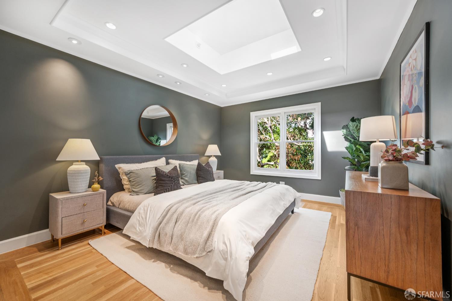 639 14th Street San Francisco, CA 94114 - Photo 26 of 54 a bedroom with bed and a large window