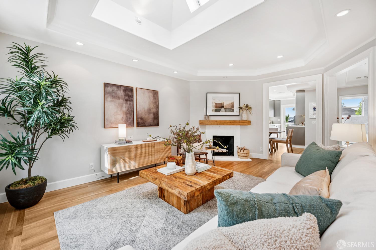 639 14th Street San Francisco, CA 94114 - Photo 9 of 54 a living room with furniture a fireplace and a potted plant
