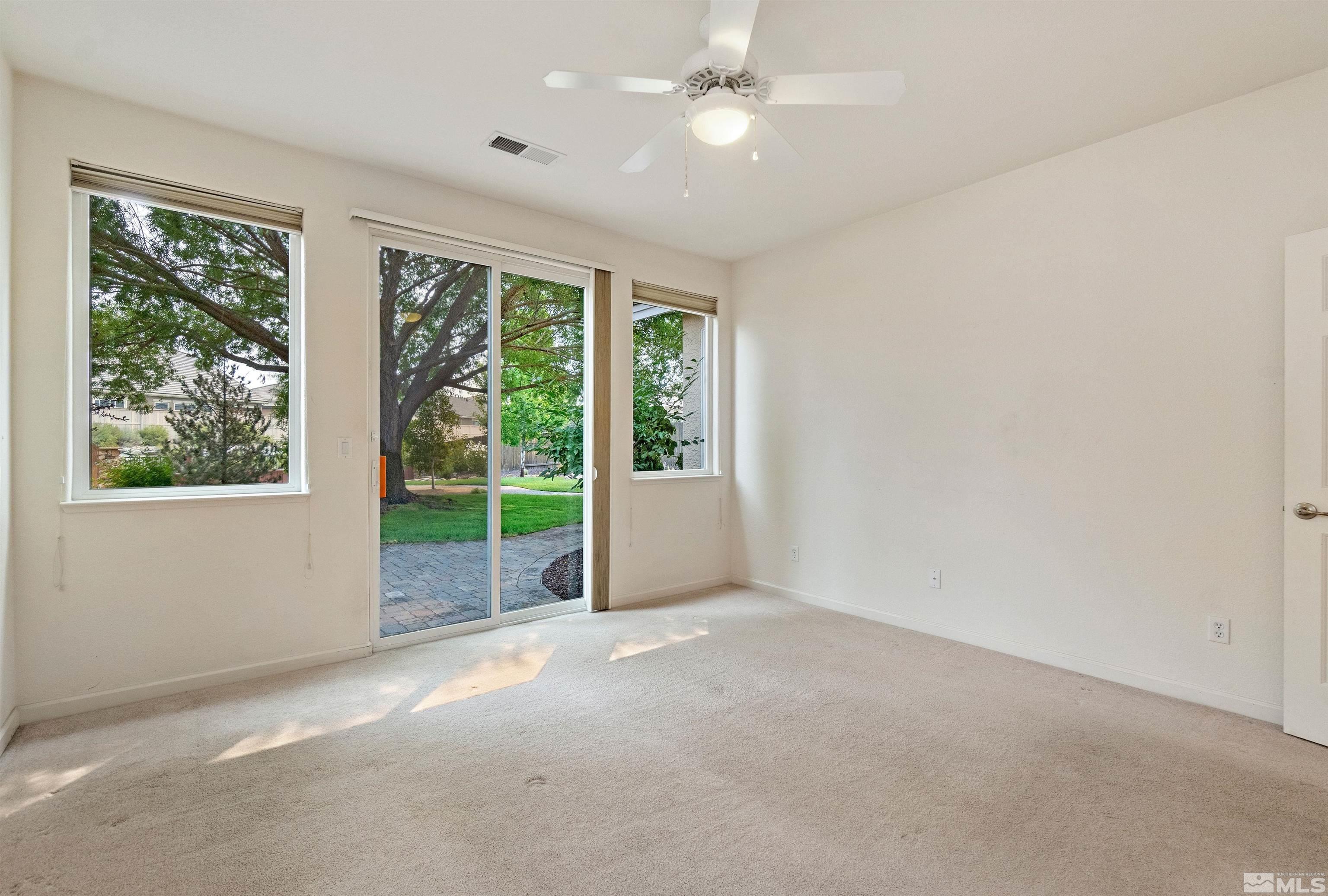 1790 Camaraderie Way Reno, NV 89521 - Photo 21 of 40 an empty room with windows and outdoor view