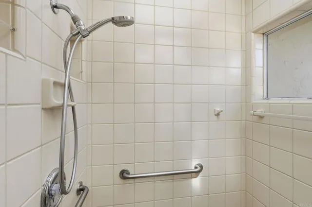 a view of a patio with table and chairs and wooden floor
