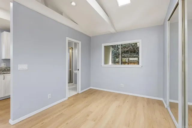 a view of a balcony with yard