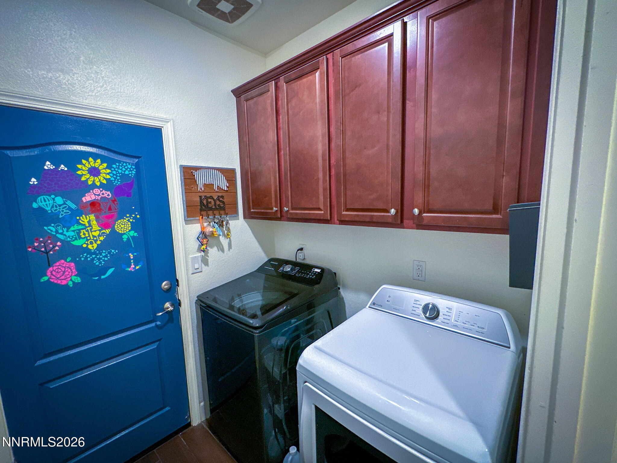 7330 Overture Drive Reno, NV 89506 - Photo 15 of 17 a utility room with dryer and washer