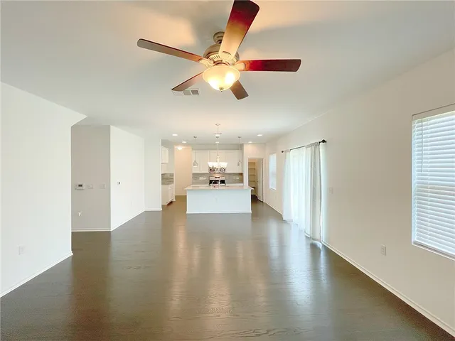 a view of a hallway with staircase
