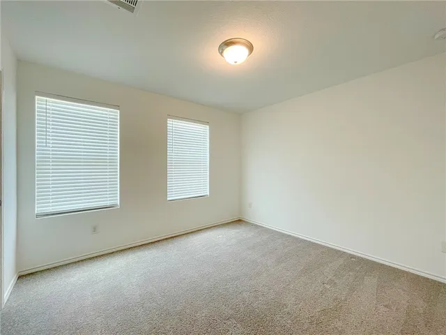 an empty room with a natural light