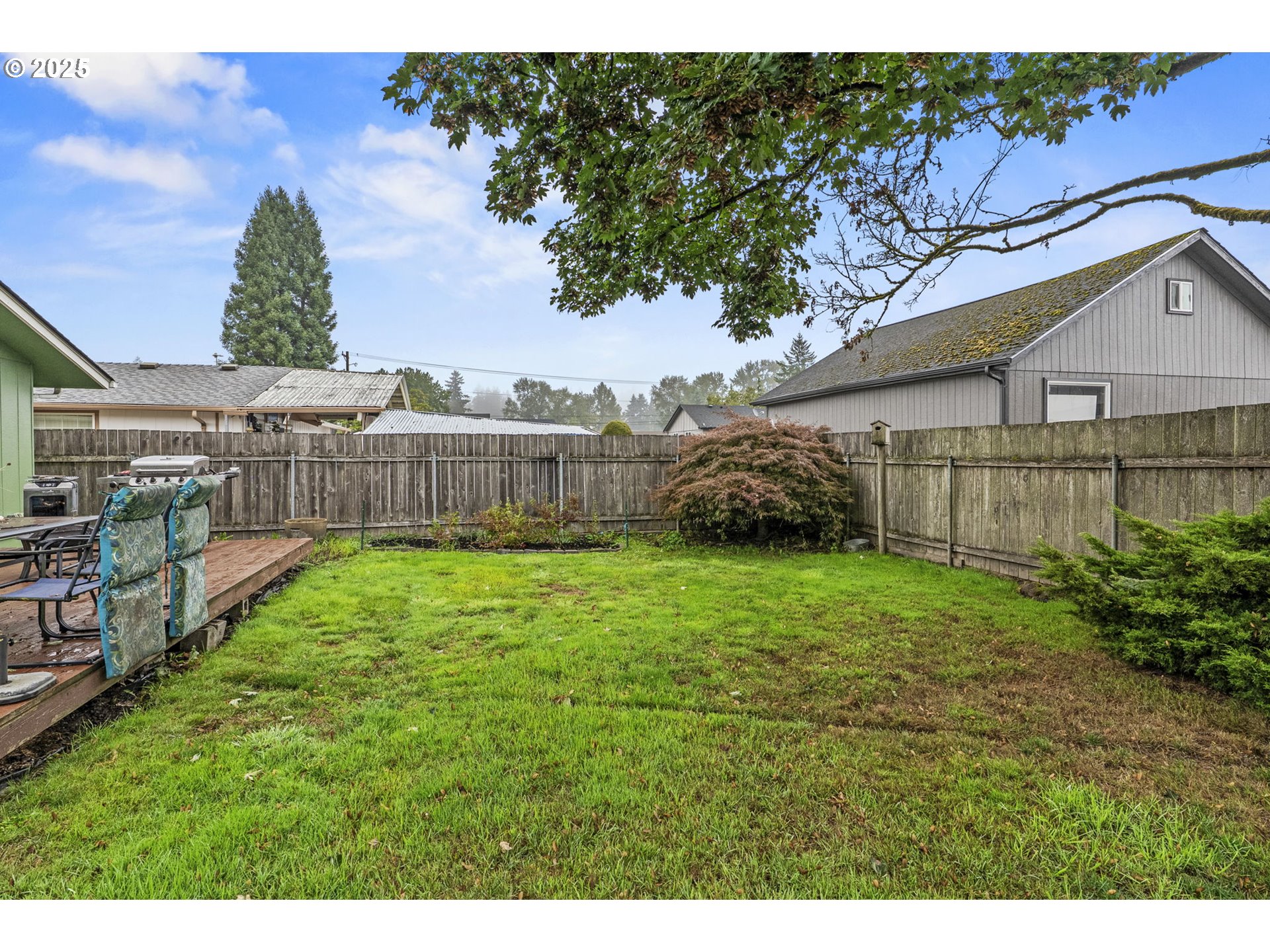2634 34th Avenue Longview, WA 98632 - Photo 18 of 22 a view of a porch with a garden