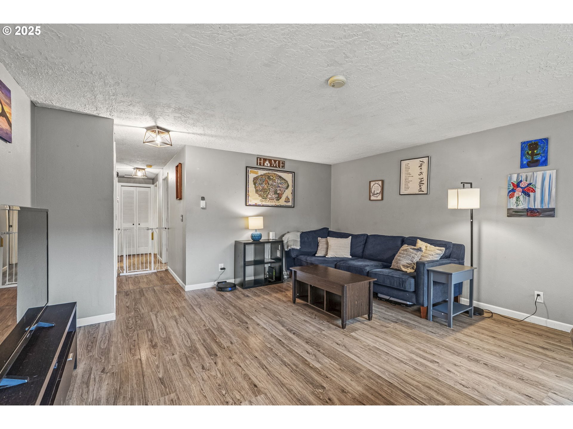 2634 34th Avenue Longview, WA 98632 - Photo 4 of 22 a living room with furniture and a wooden floor