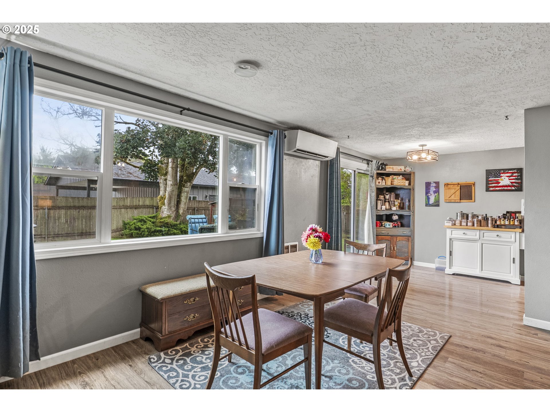 2634 34th Avenue Longview, WA 98632 - Photo 6 of 22 a view of a dining room with furniture window and wooden floor