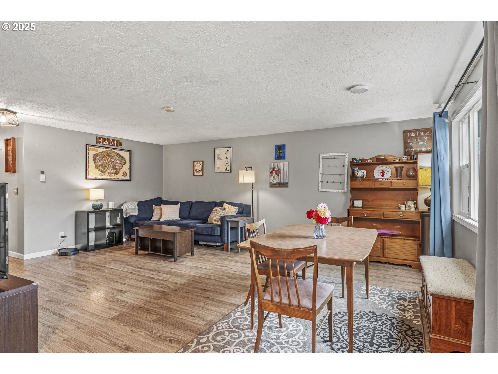 2634 34th Avenue Longview, WA 98632 - Photo 8 of 22 a dining room with furniture and wooden floor