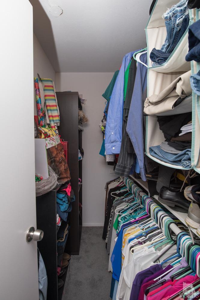 1718 Sinaloa Road, Unit 117 Simi Valley, CA 93065 - Photo 18 of 23 a view of walk in closet with clothes and shoes