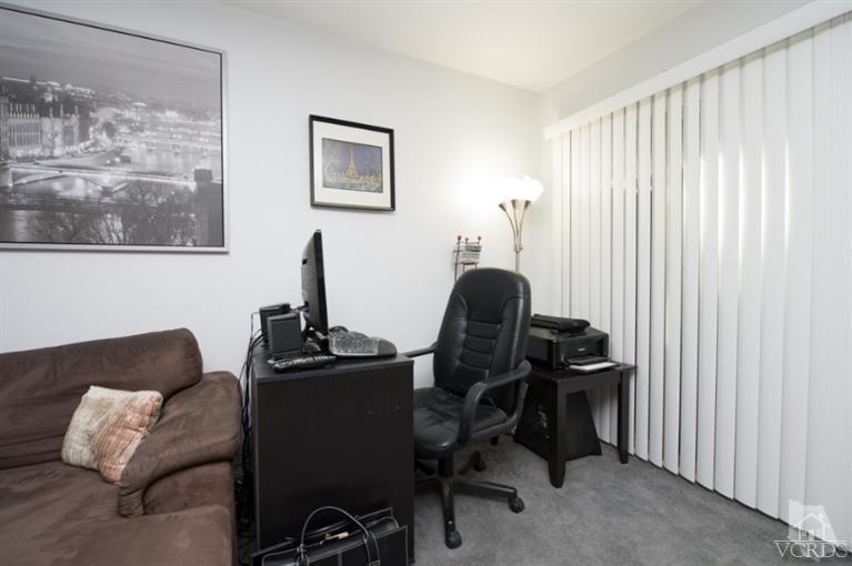1718 Sinaloa Road, Unit 117 Simi Valley, CA 93065 - Photo 6 of 23 a view of a workspace with furniture and a window