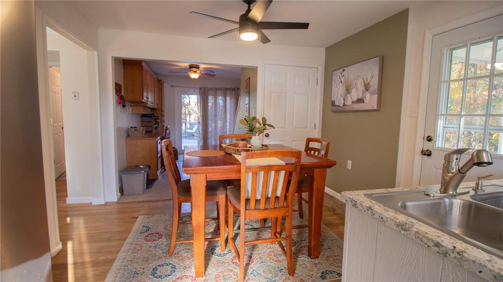 130 Waltz Mill Road Ruffs Dale, PA 15679 - Photo 12 of 34 a view of a dining room with furniture and chandelier