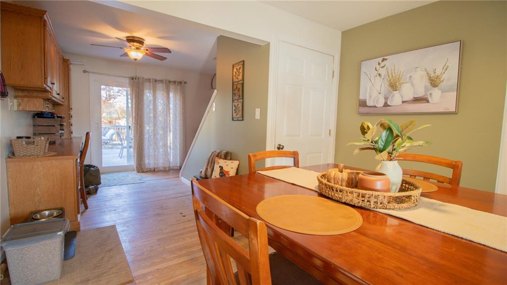 130 Waltz Mill Road Ruffs Dale, PA 15679 - Photo 13 of 34 a dining room with wooden floor and furniture