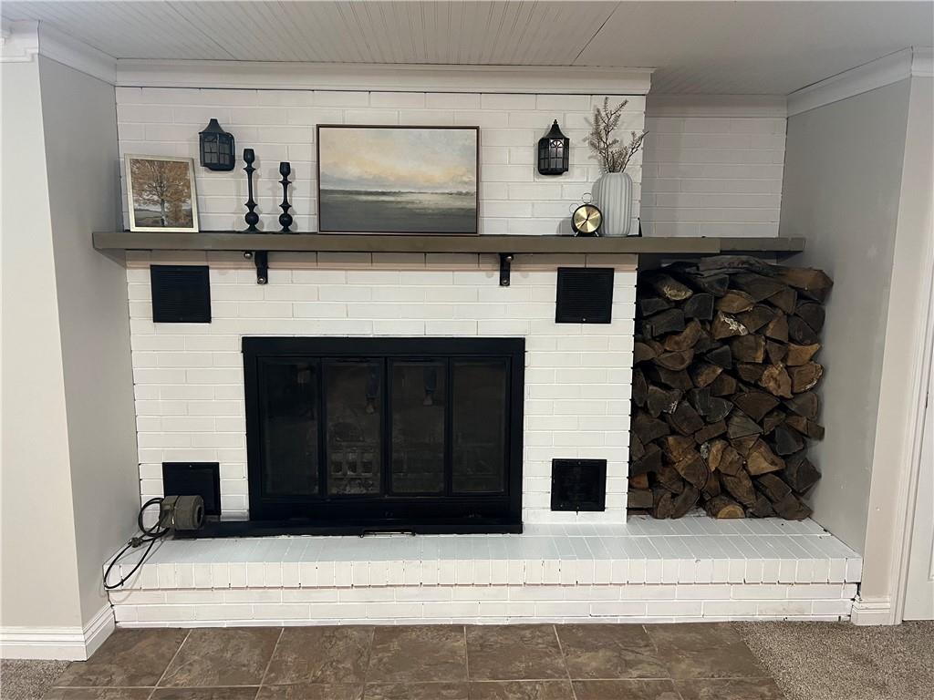 130 Waltz Mill Road Ruffs Dale, PA 15679 - Photo 22 of 34 a living room with fireplace
