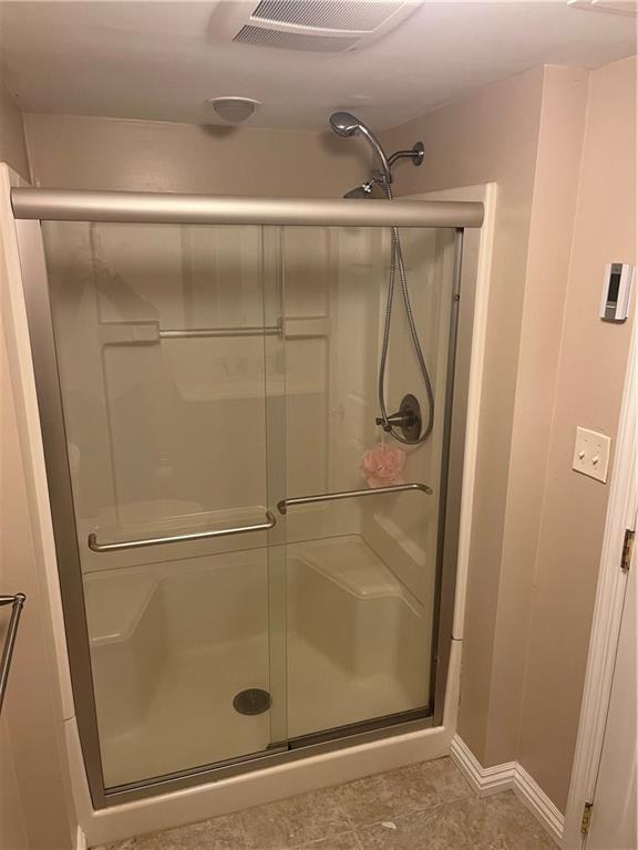 130 Waltz Mill Road Ruffs Dale, PA 15679 - Photo 26 of 34 a bathroom with a glass shower door