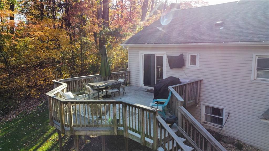130 Waltz Mill Road Ruffs Dale, PA 15679 - Photo 28 of 34 a balcony with table and chairs