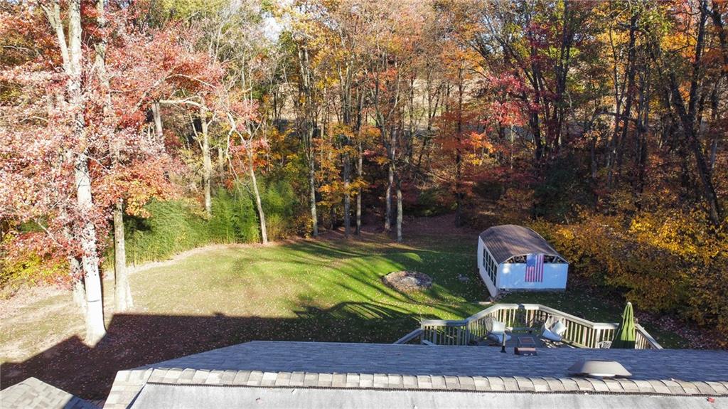 130 Waltz Mill Road Ruffs Dale, PA 15679 - Photo 32 of 34 a view of a garden with an outdoor space