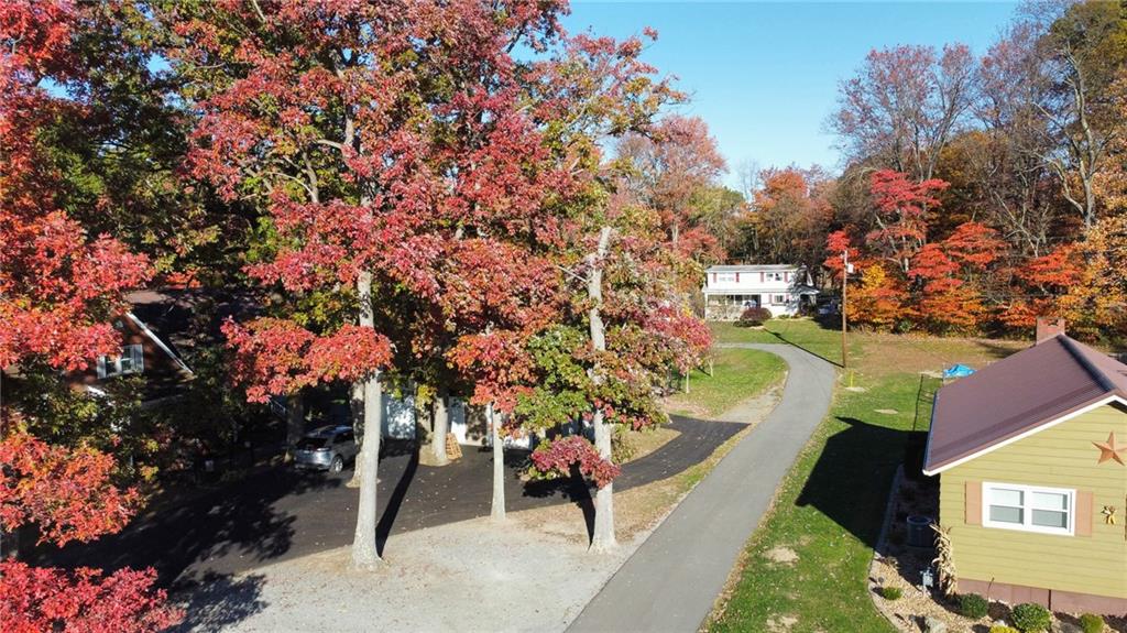 130 Waltz Mill Road Ruffs Dale, PA 15679 - Photo 6 of 34 a view of a house with a yard
