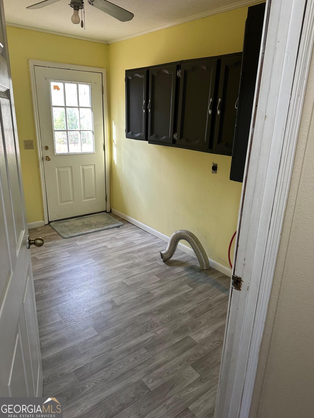 160 Macon Road McIntyre, GA 31054 - Photo 14 of 22 a view of a room with wooden floor and windows
