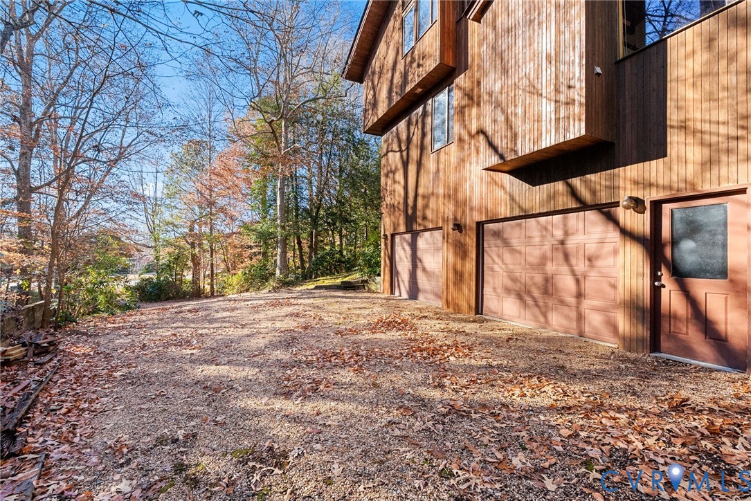 701 Colony Trail Lanexa, VA 23089 - Photo 13 of 50 a view of a yard with wooden fence