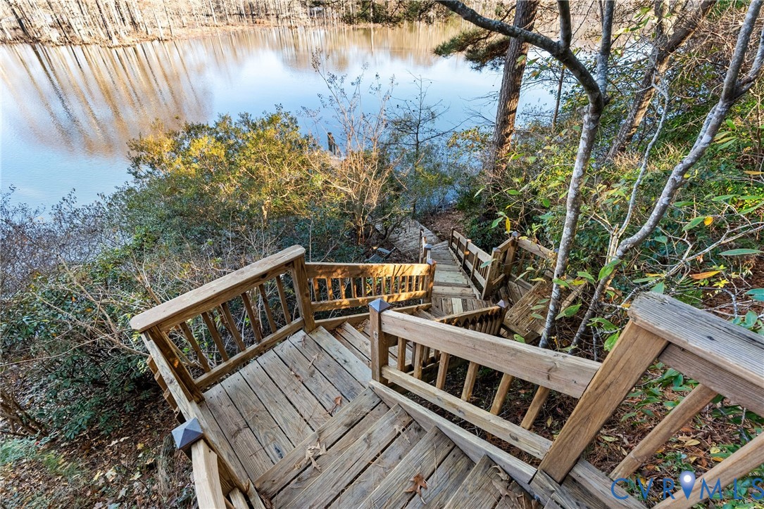 701 Colony Trail Lanexa, VA 23089 - Photo 22 of 50 a view of a roof deck with wooden floor and fence
