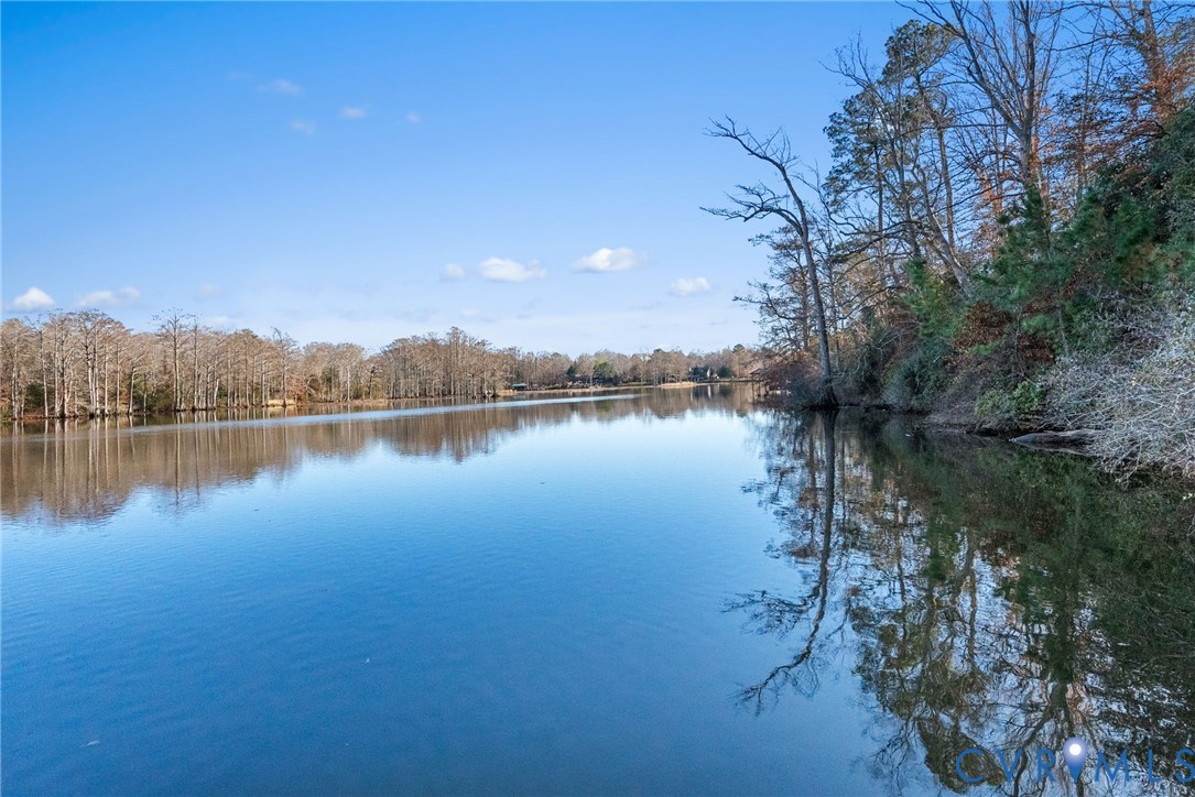 701 Colony Trail Lanexa, VA 23089 - Photo 24 of 50 a view of a lake with houses