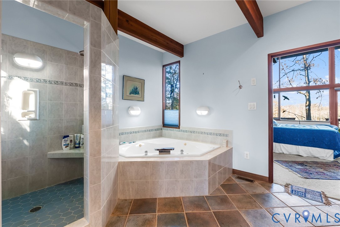 701 Colony Trail Lanexa, VA 23089 - Photo 41 of 50 a view of a bathroom with a bathtub and a sink