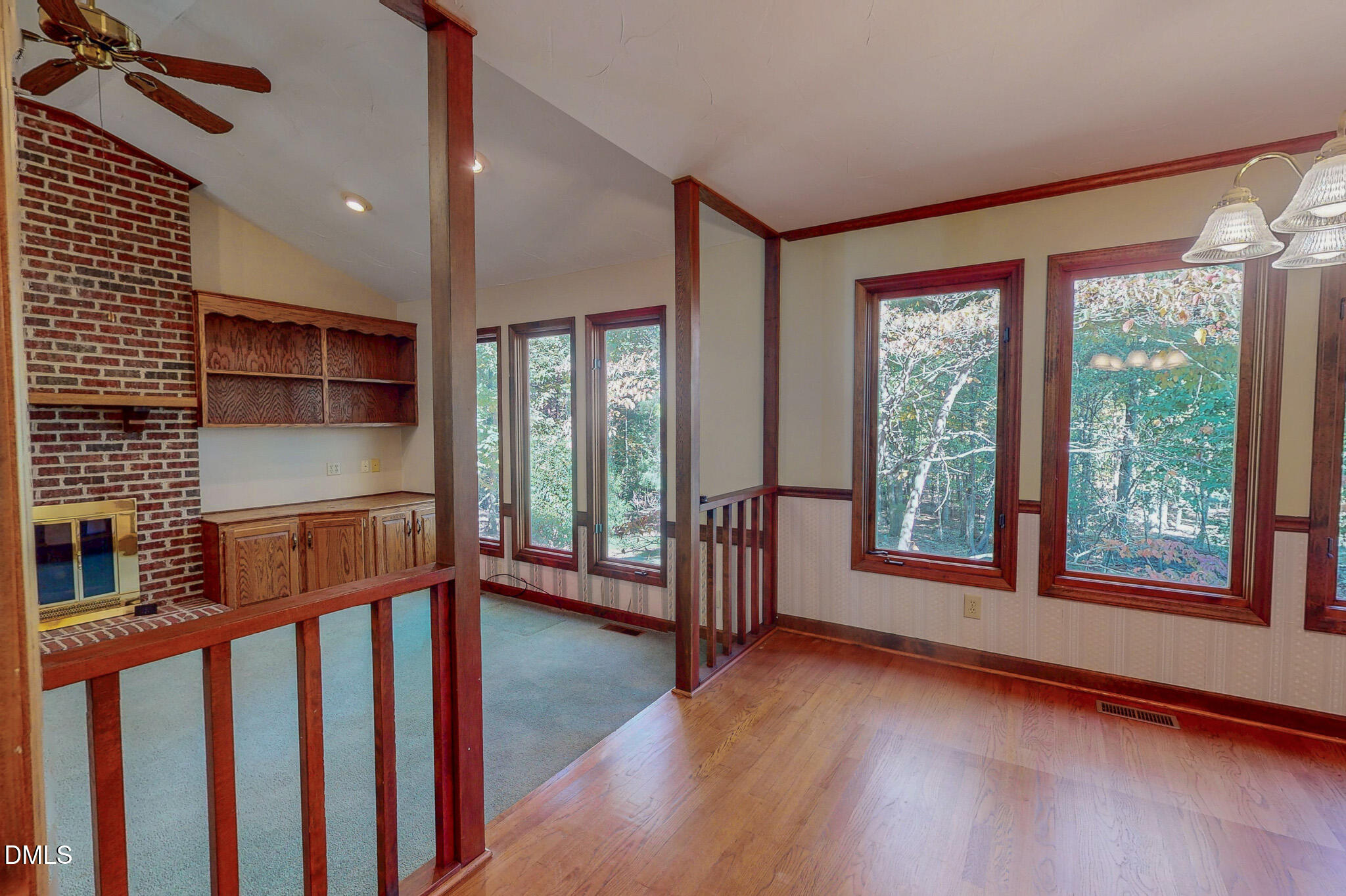 11 Denada Path Roxboro, NC 27574 - Photo 24 of 57 a view of hallway with stairs and wooden floor