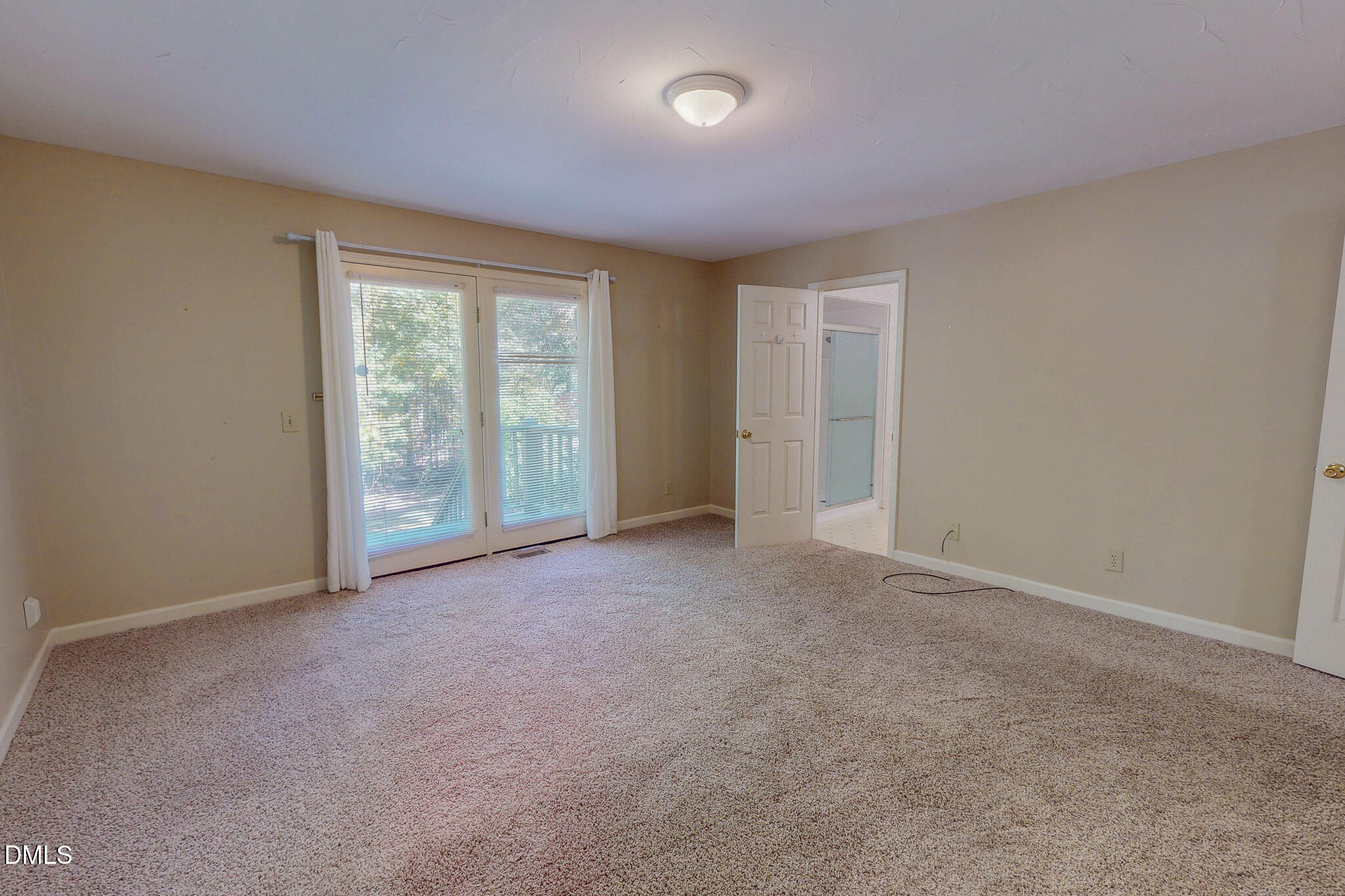 11 Denada Path Roxboro, NC 27574 - Photo 27 of 57 an empty room with windows and city view