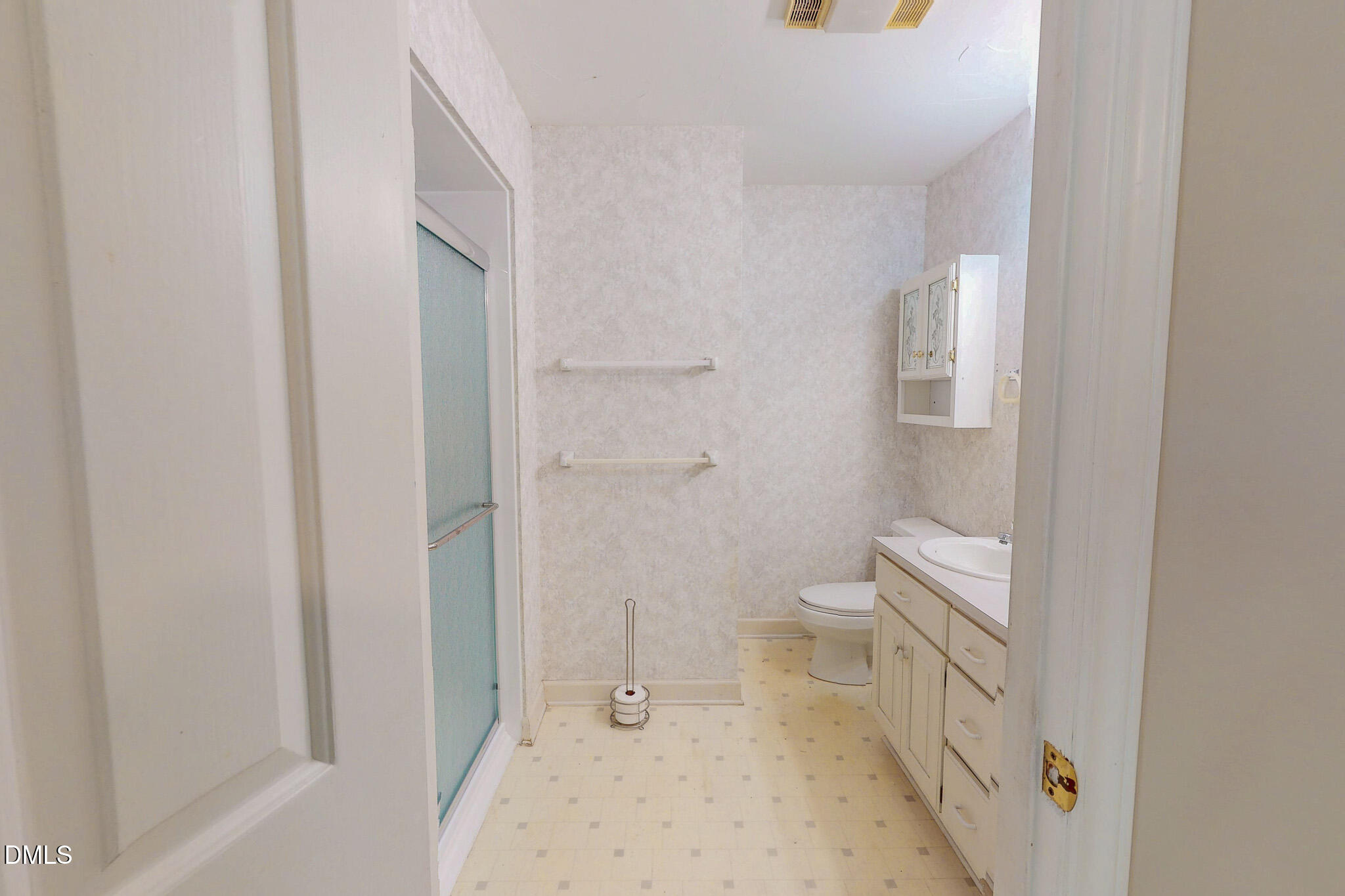 11 Denada Path Roxboro, NC 27574 - Photo 30 of 57 a bathroom with a toilet sink and a shower