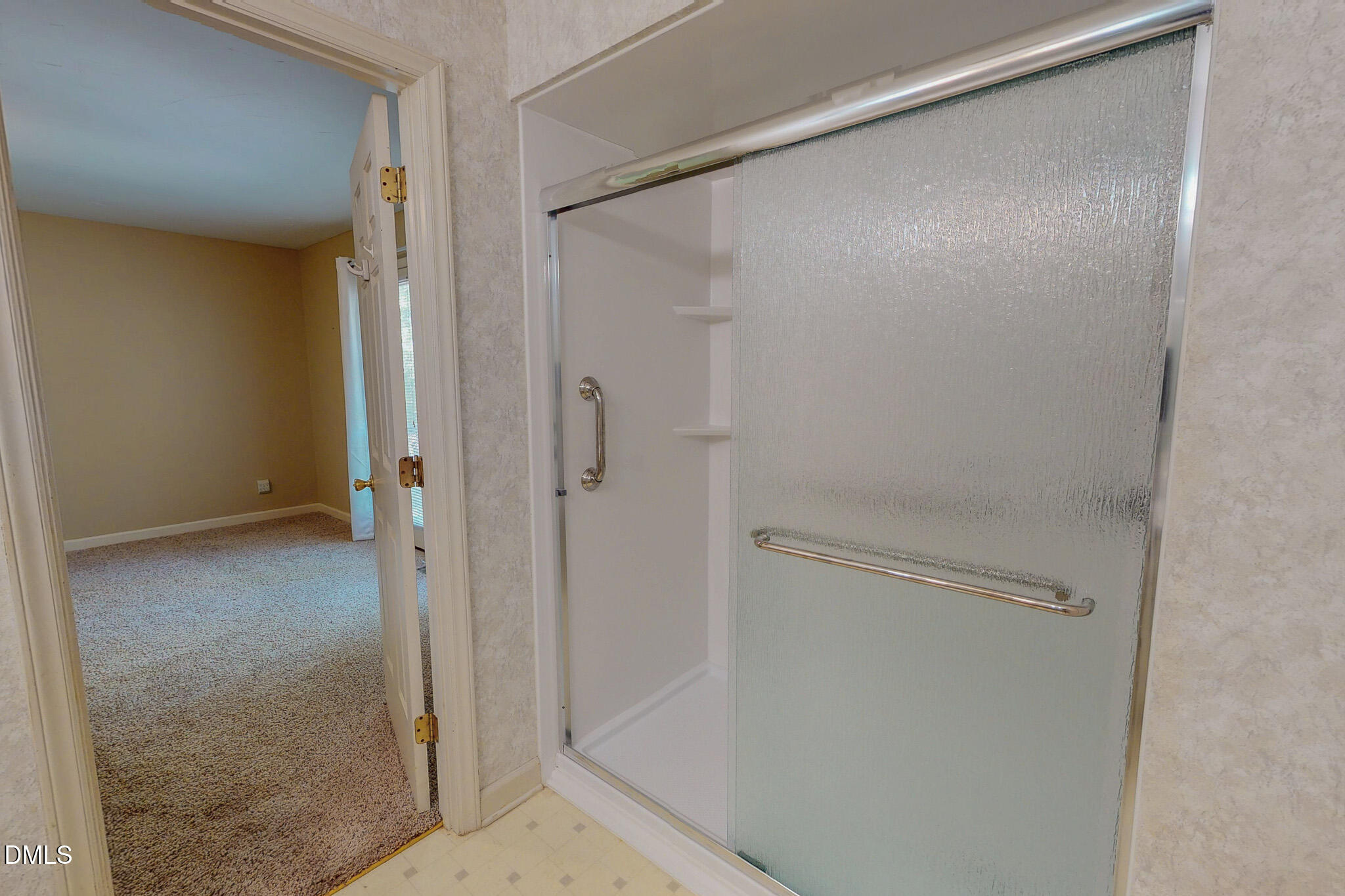 11 Denada Path Roxboro, NC 27574 - Photo 32 of 57 a bathroom with a glass shower door