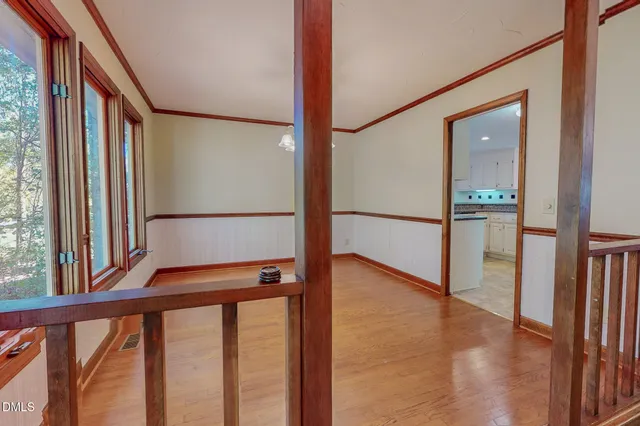 a kitchen with stainless steel appliances granite countertop a stove a refrigerator and a stove