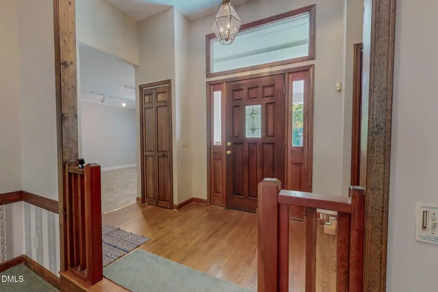 a view of a bedroom from a hallway