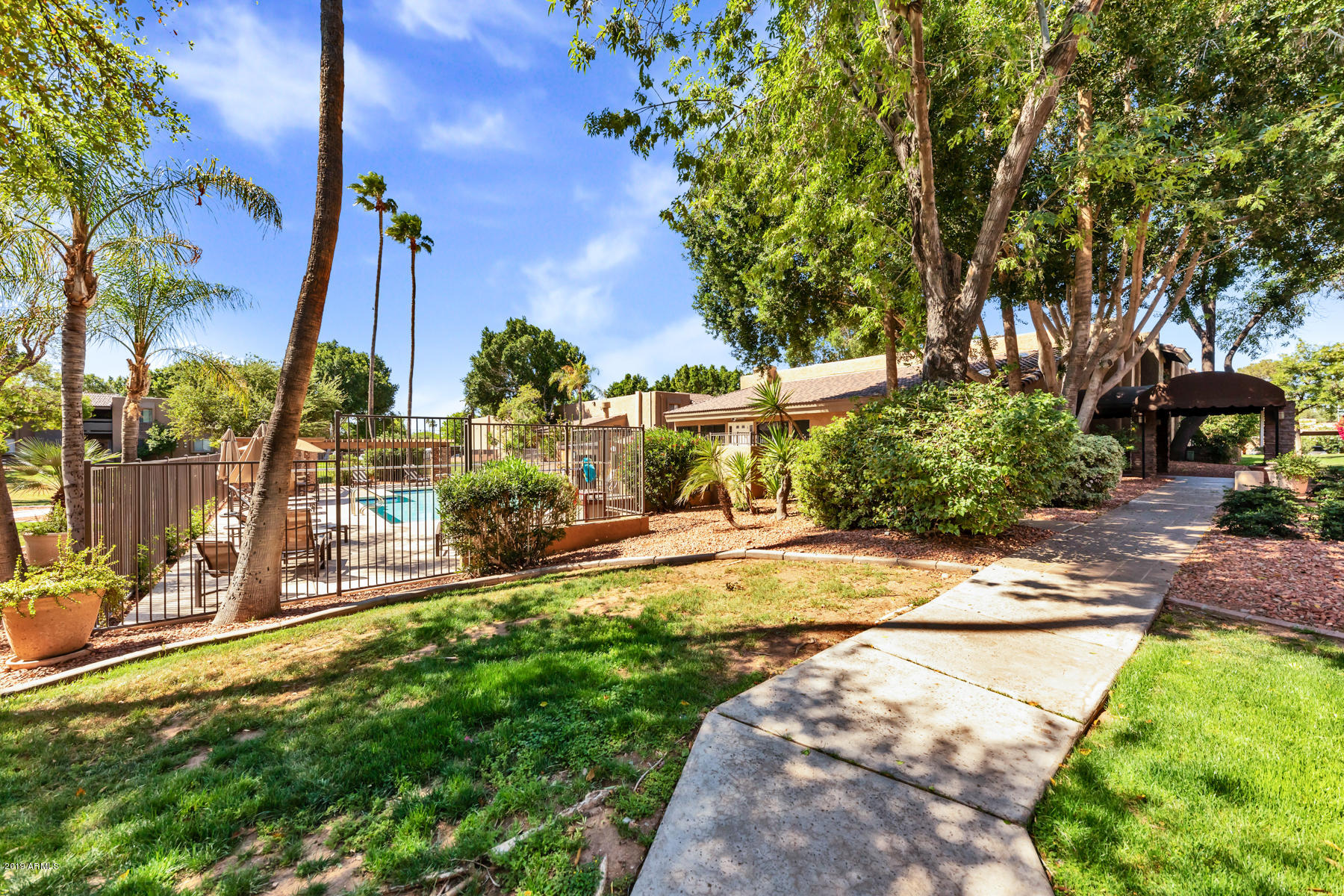 3825 East Camelback Road, Unit 203 Phoenix, AZ 85018 - Photo 13 of 15 Pool and exercise clubhouse