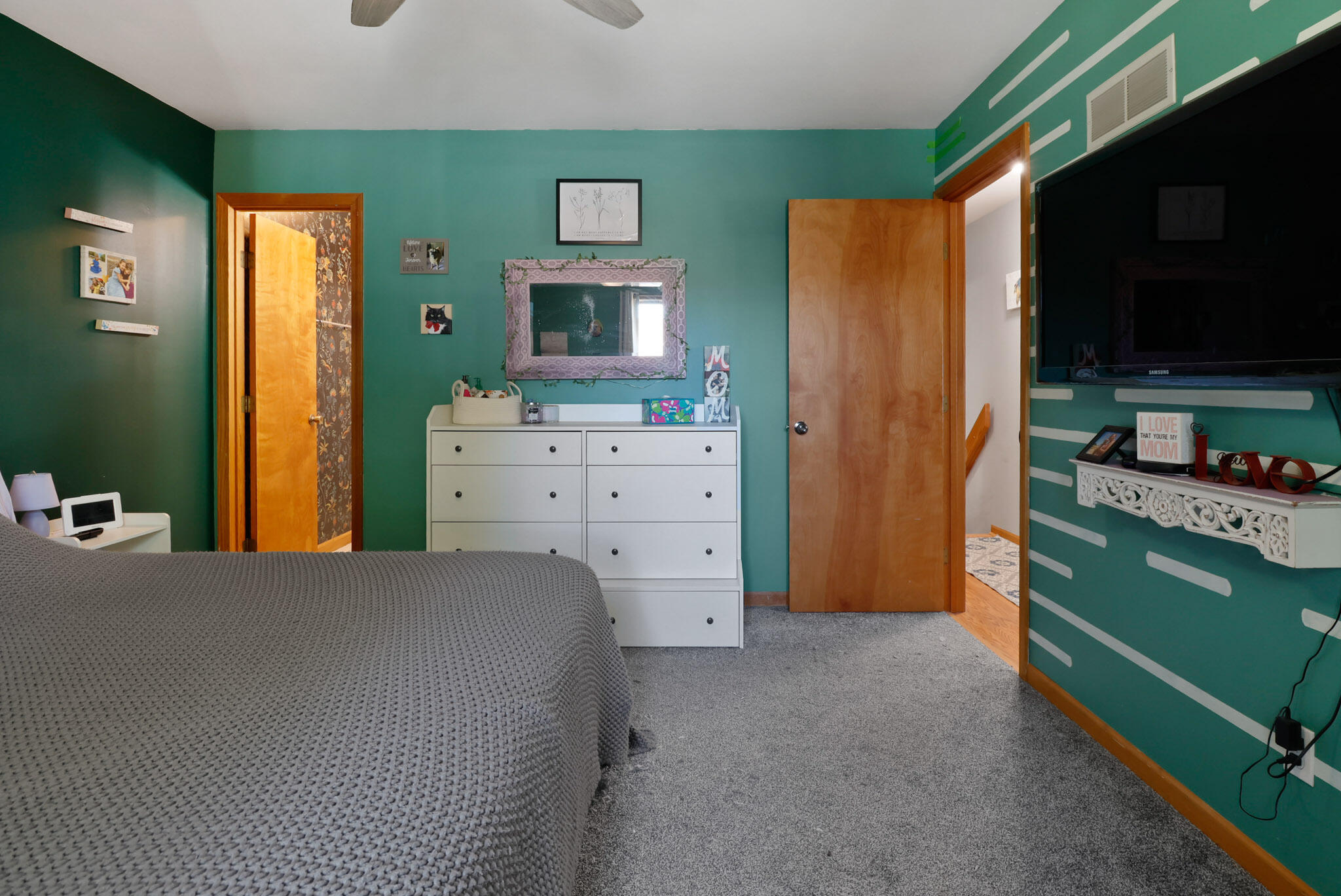 3712 Baldwin Street Portage, IN 46368 - Photo 17 of 26 a bedroom with a bed and furniture