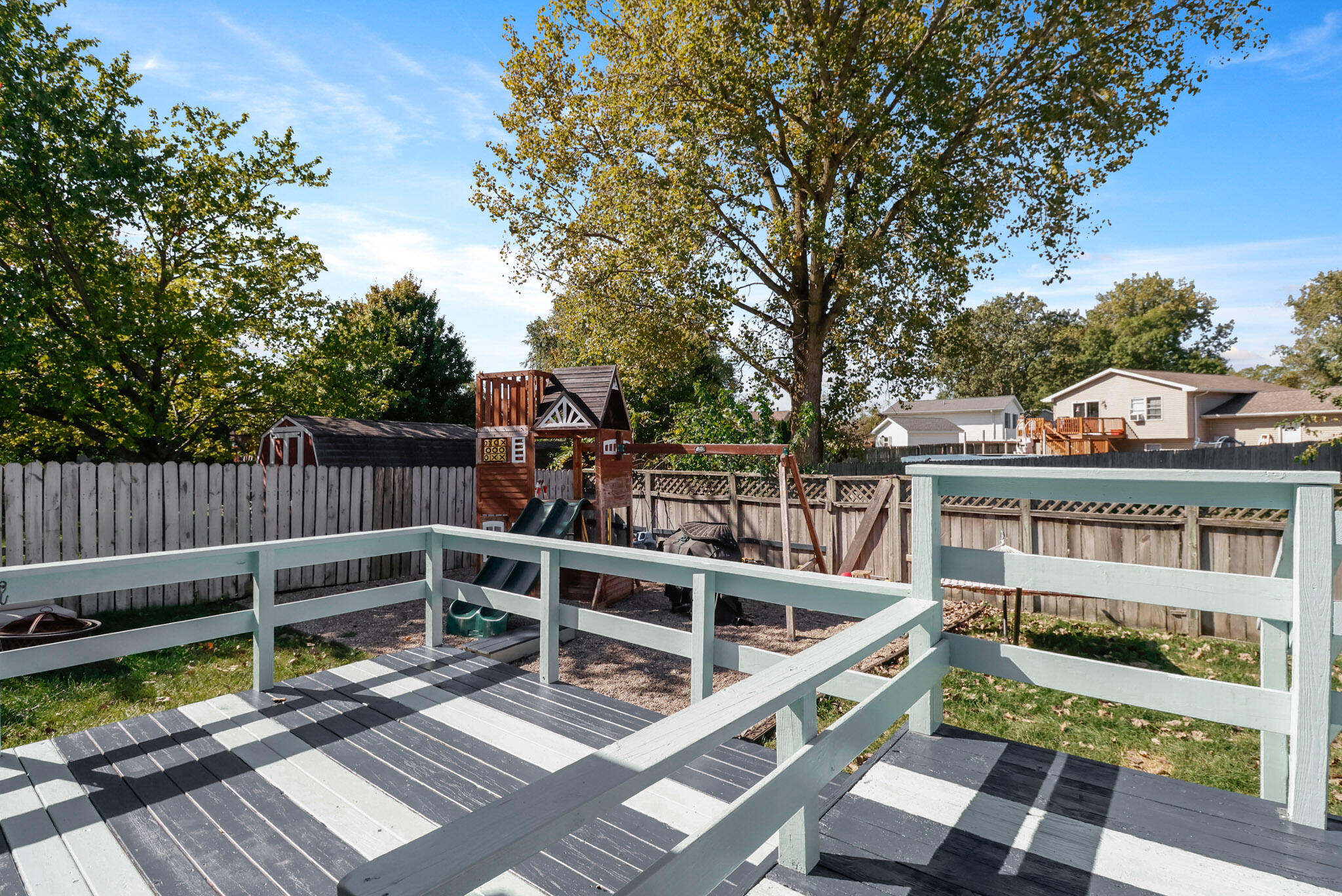 3712 Baldwin Street Portage, IN 46368 - Photo 24 of 26 a view of balcony with wooden floor and fence