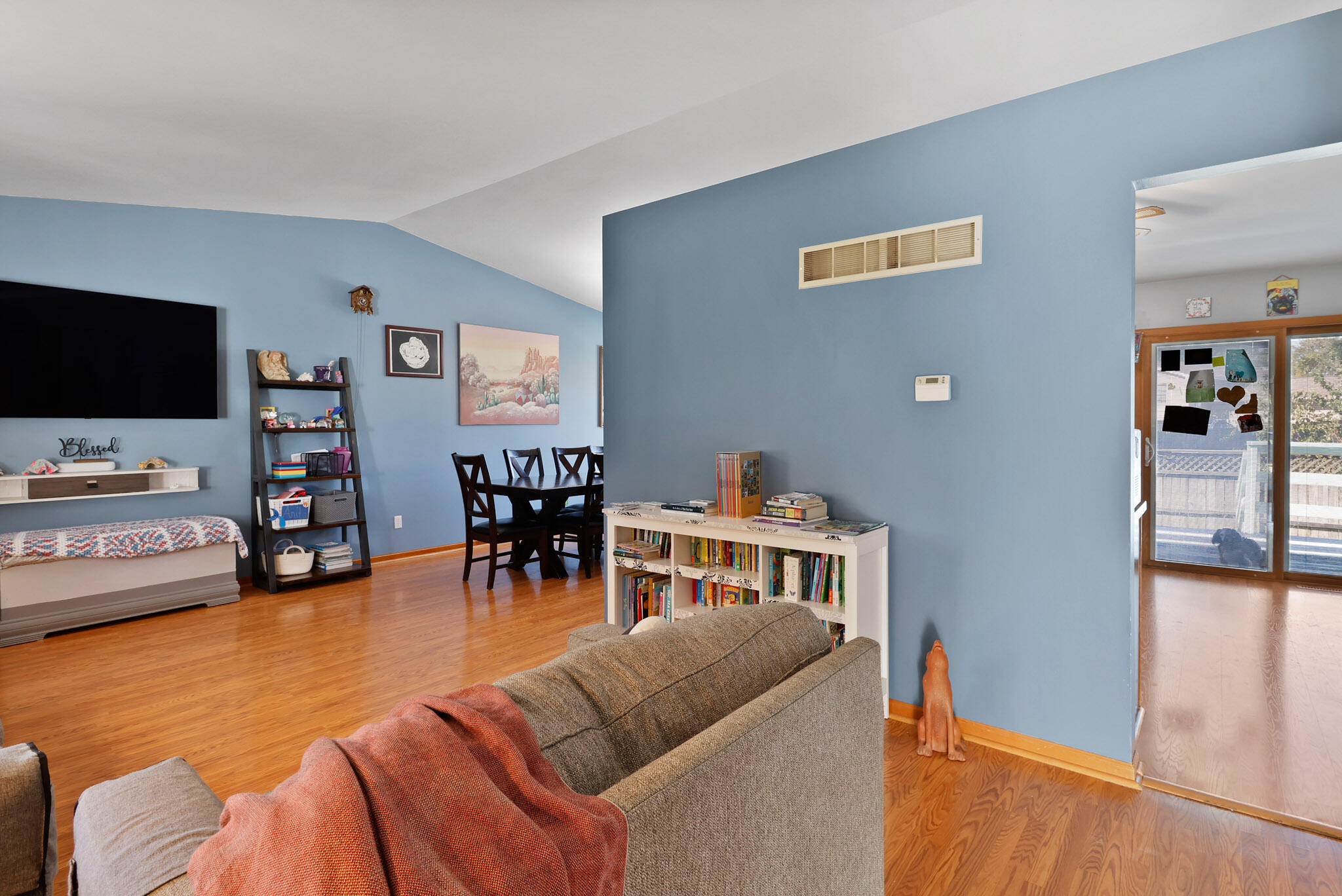 3712 Baldwin Street Portage, IN 46368 - Photo 4 of 26 a living room with furniture and a flat screen tv