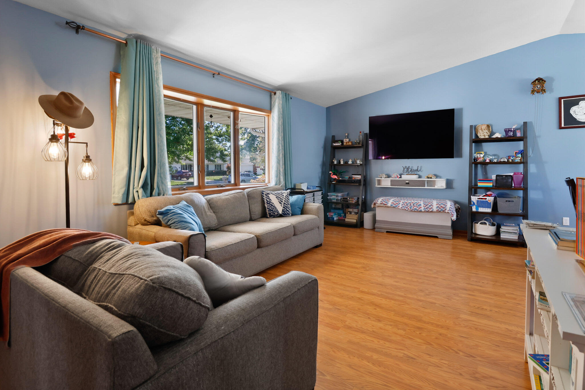 3712 Baldwin Street Portage, IN 46368 - Photo 5 of 26 a living room with furniture and a flat screen tv